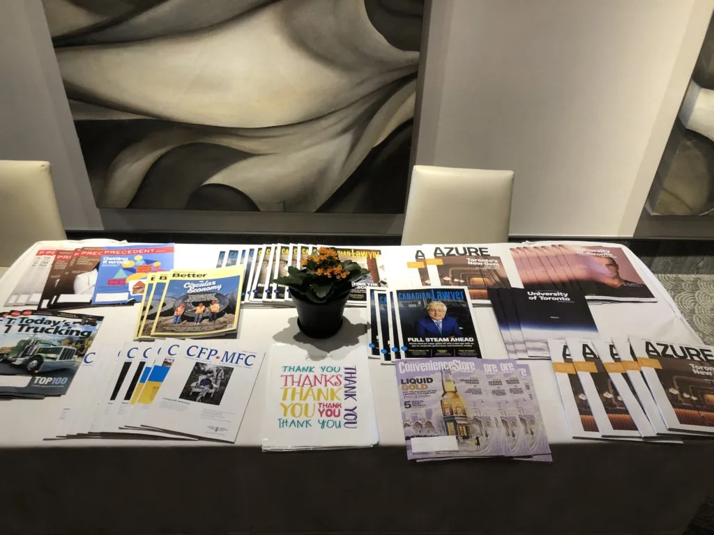A table displaying an array of business and trade magazine covers, including Azure, Canadian Lawyer, and Better